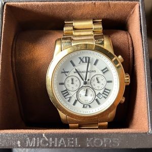 Gold Michael Kors watch - white face